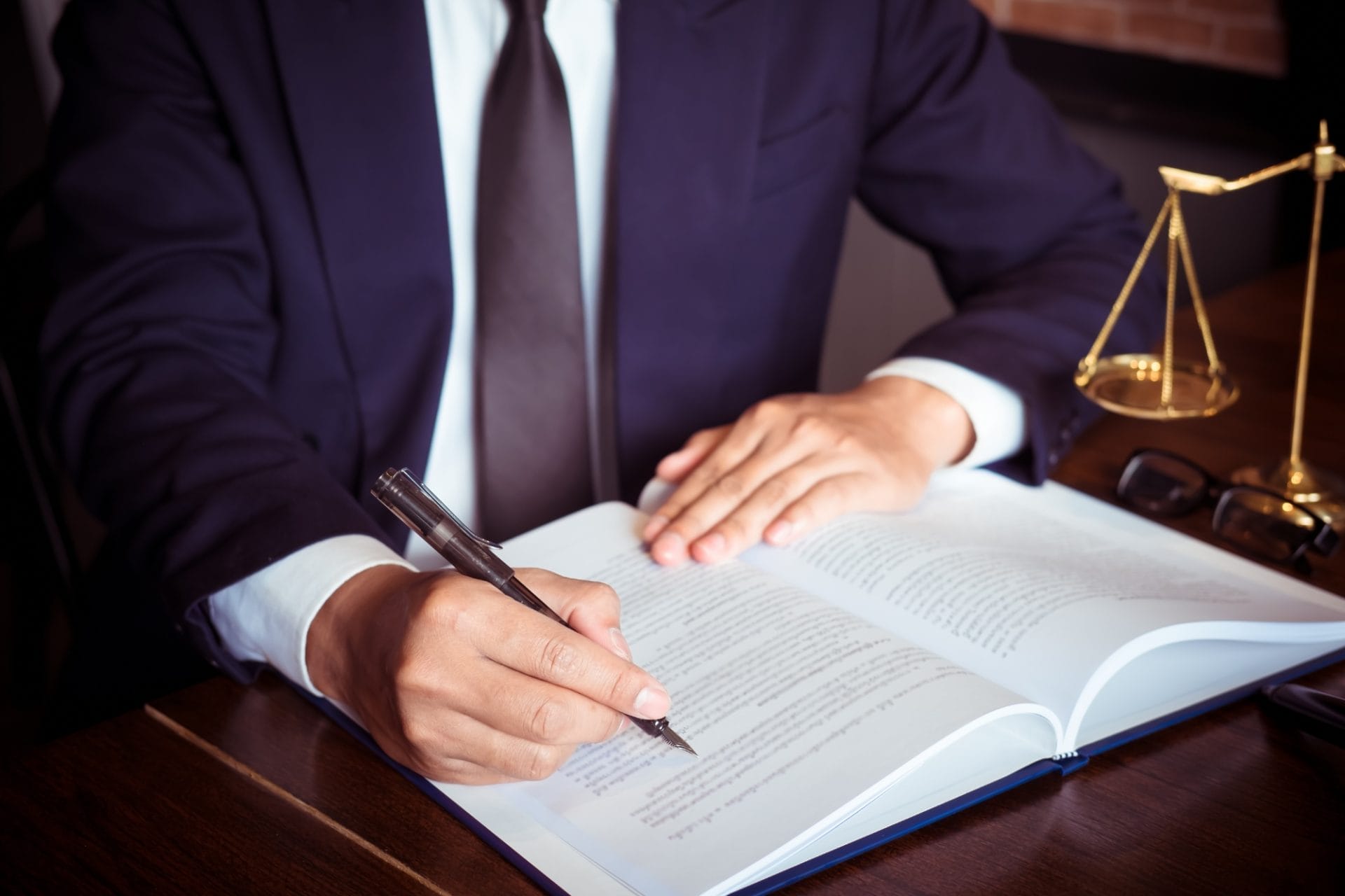 solicitor reading a document