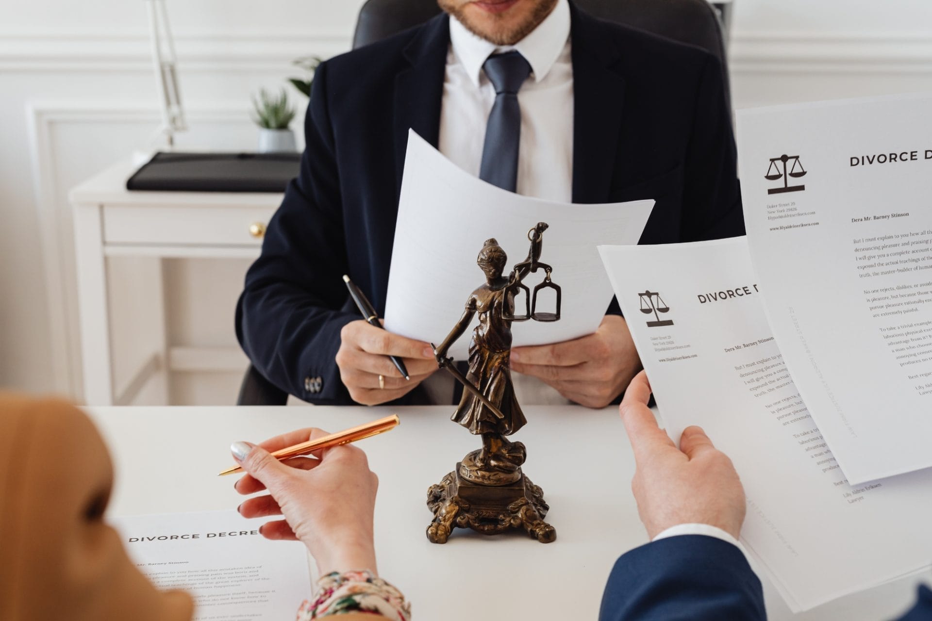 Divorce lawyer explaining documentations to couple